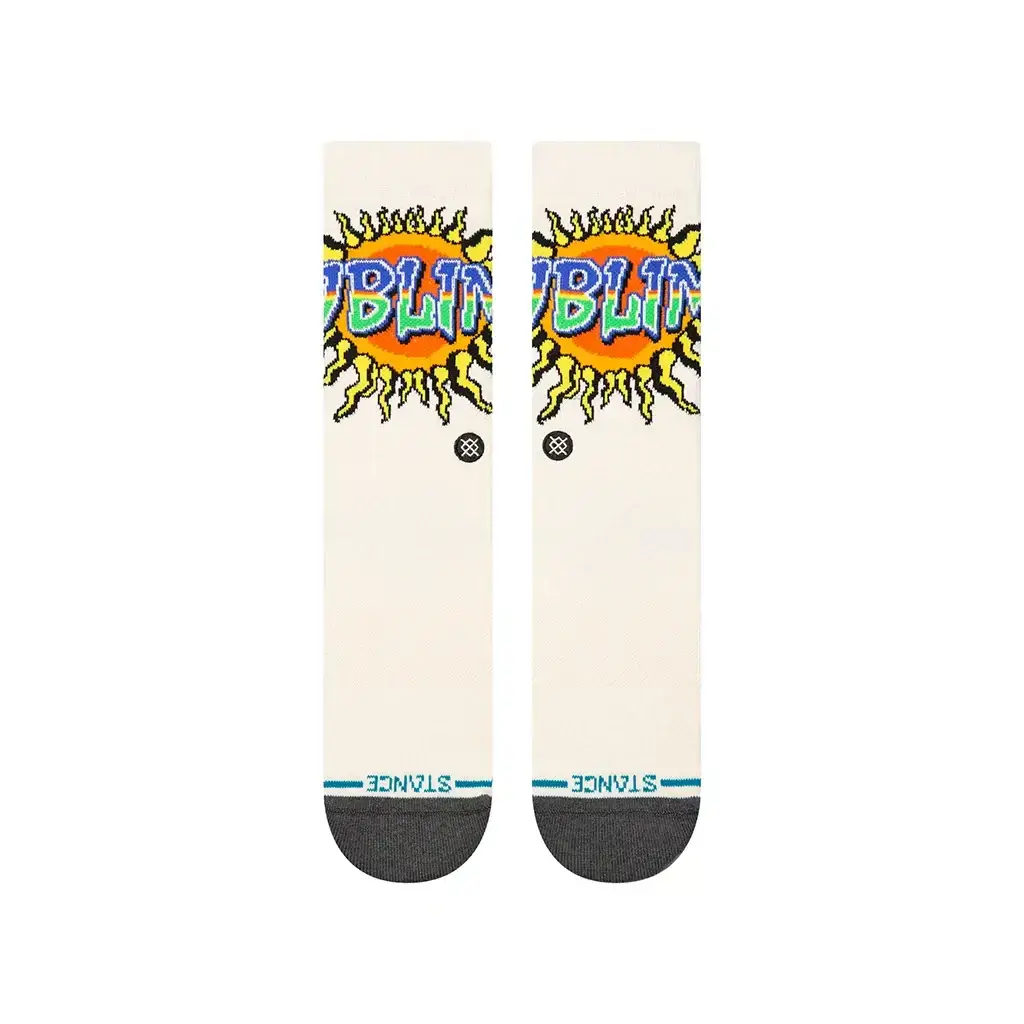 Stance Sublime Crew Socks showcasing a vibrant sun design, medium cushion, and combed cotton blend material.