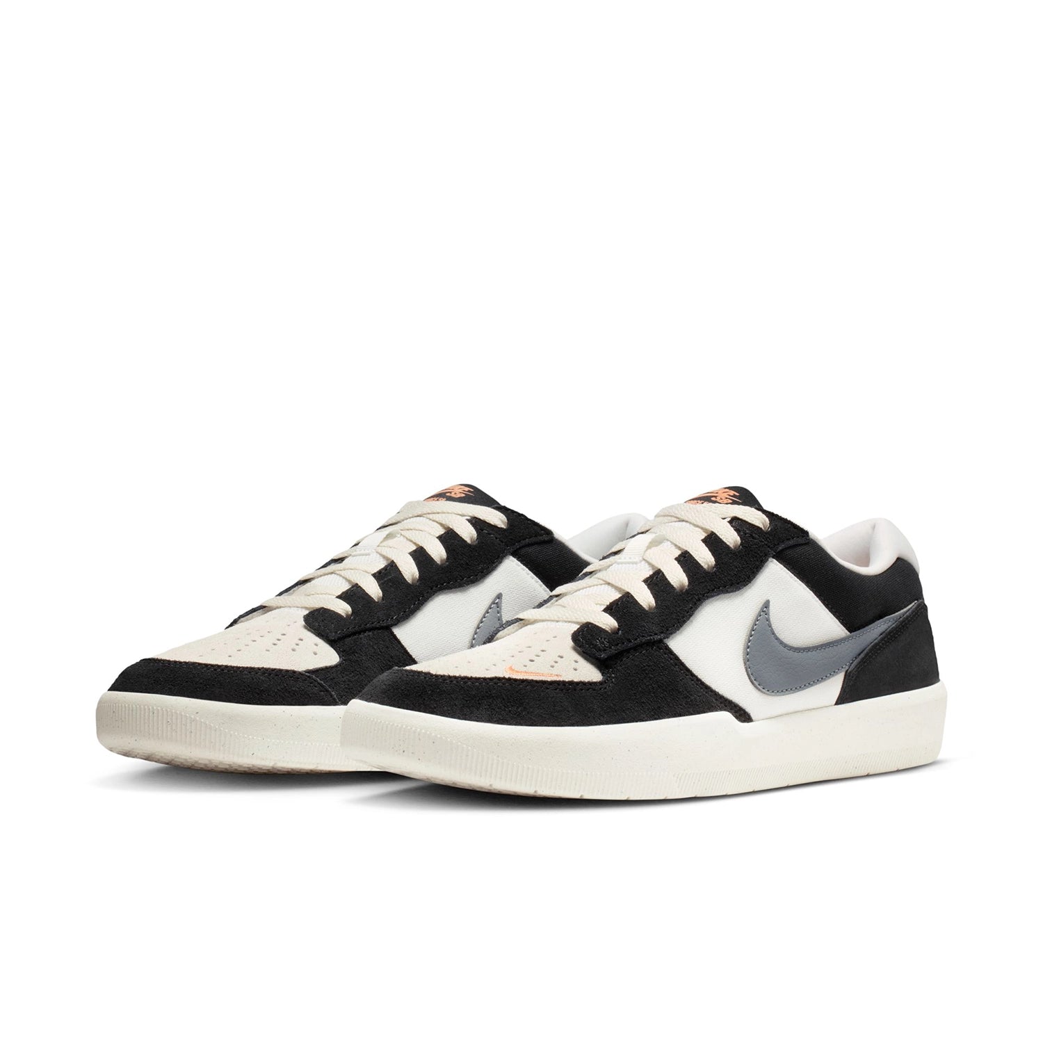 A pair of Black and white Nike SB Force 58 men's skateboard sneakers on white background
