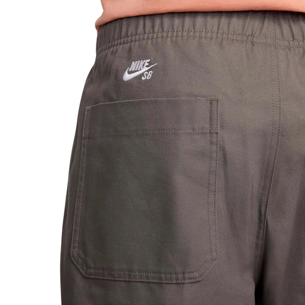 Close-up of the back pocket and logo on Nike SB Double Knee Twill Skate Pant in Cave Stone.