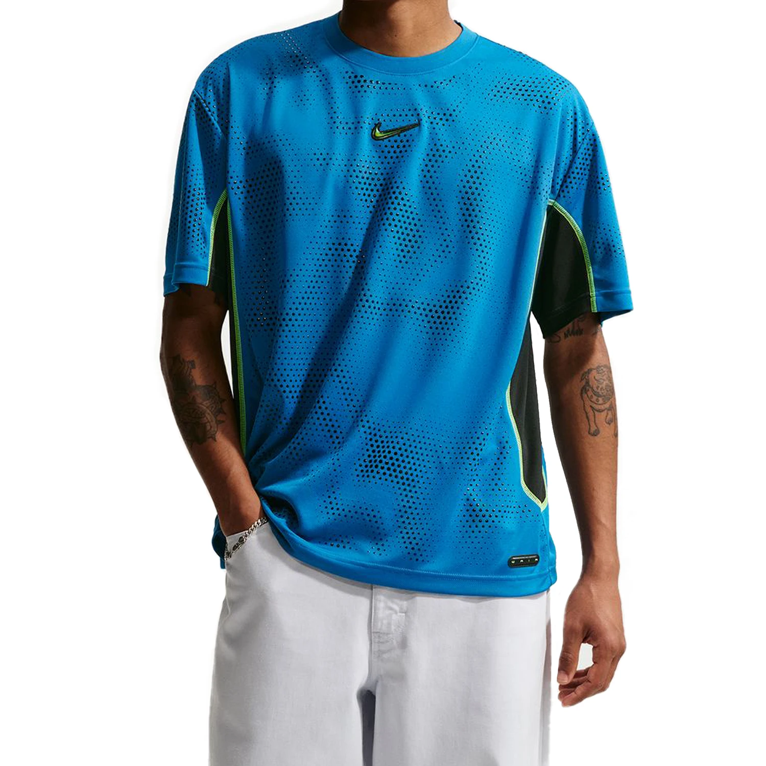 Model wearing Nike SB Ishod Wair skate jersey top in brilliant blue on a white background