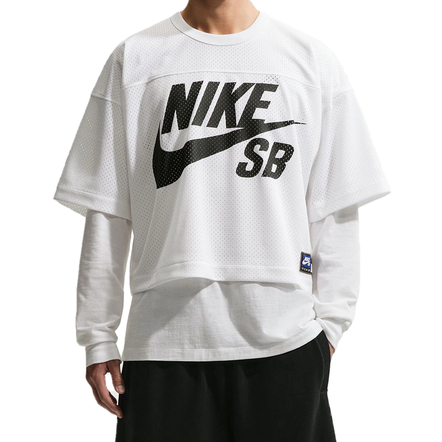 White Nike SB GFX mesh football jersey worn by a person on a white background