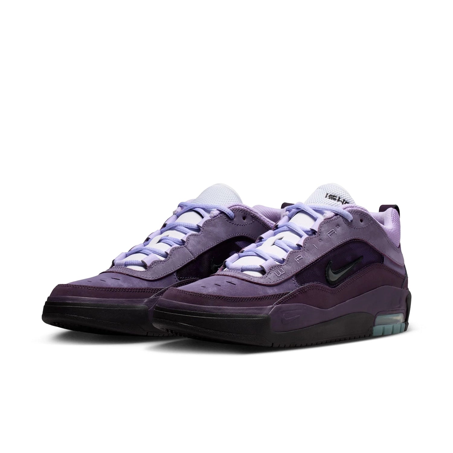 A pair of Grand purple black and noble purple Nike SB Air Max Ishod Wair pro model men's skateboard sneakers on a white background