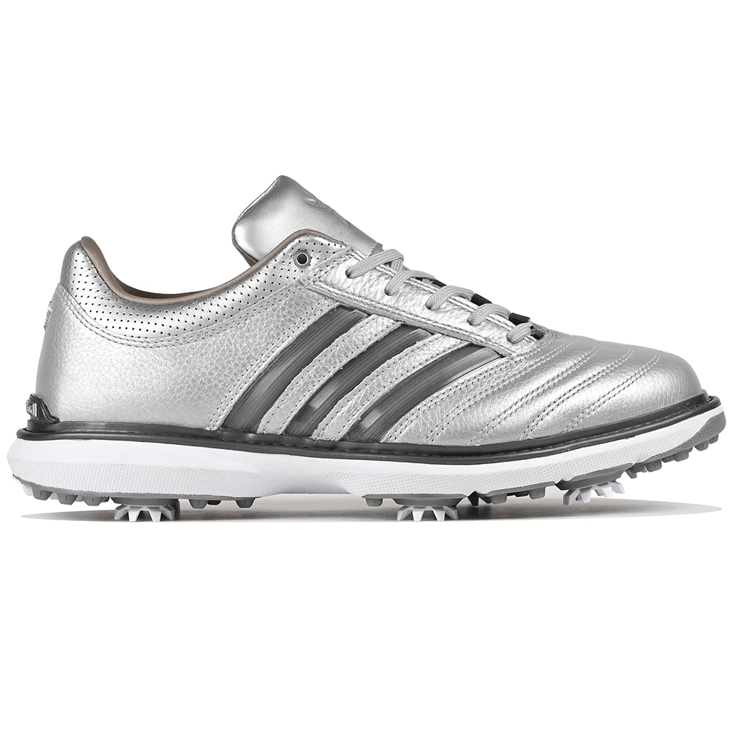 Silver metallic Adidas x Metalwood MC70 golf shoe with gray stripes on a white background
