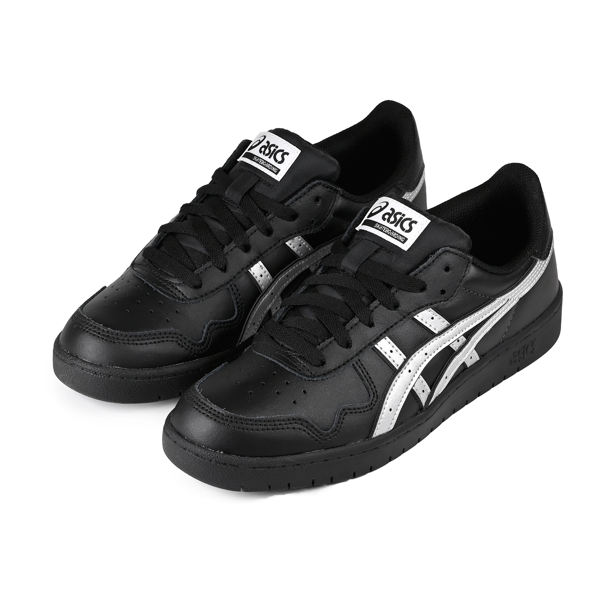 A pair of Black leather Asics Skateboarding Japan Pro skateboard sneakers with Pure Silver 'Onitsuka' branding on a white background