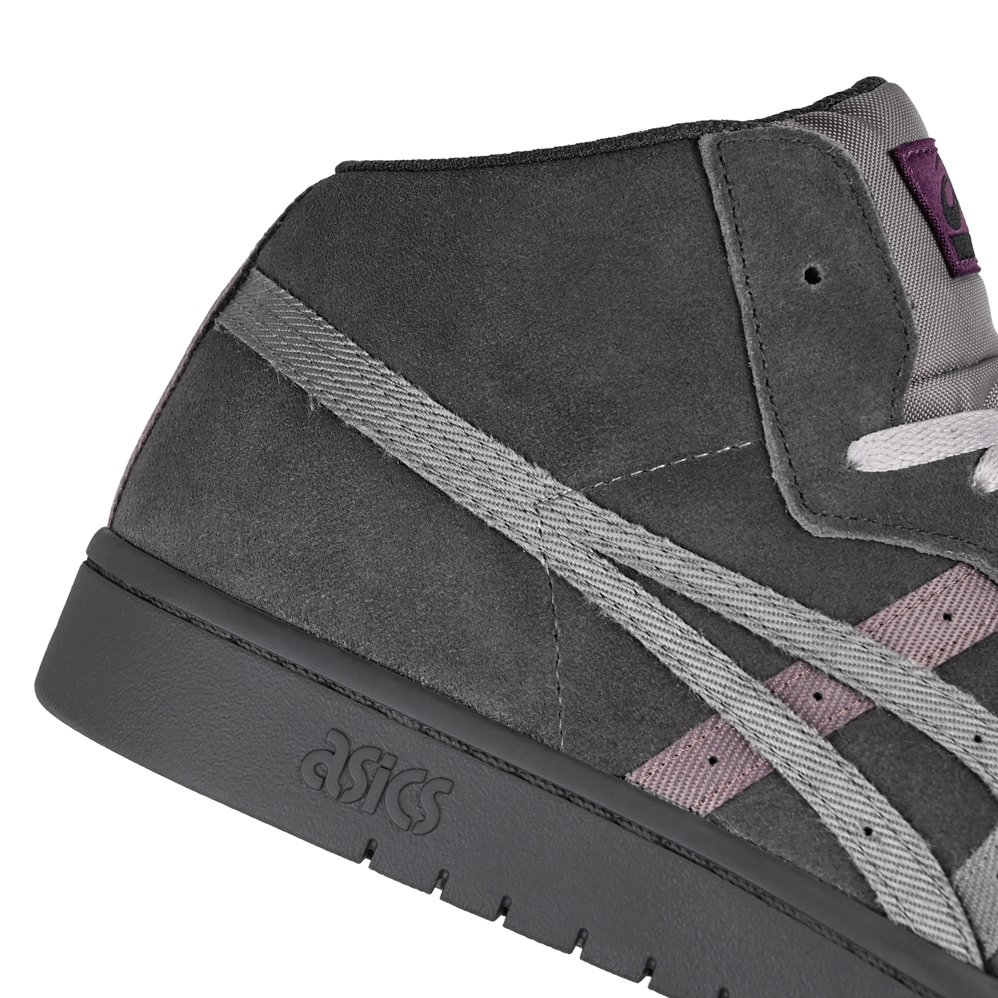 Close up of Graphite grey and clay grey ASICS Japan Mid Pro skateboard sneaker with 'Onitsuka' branding on a white backgorund
