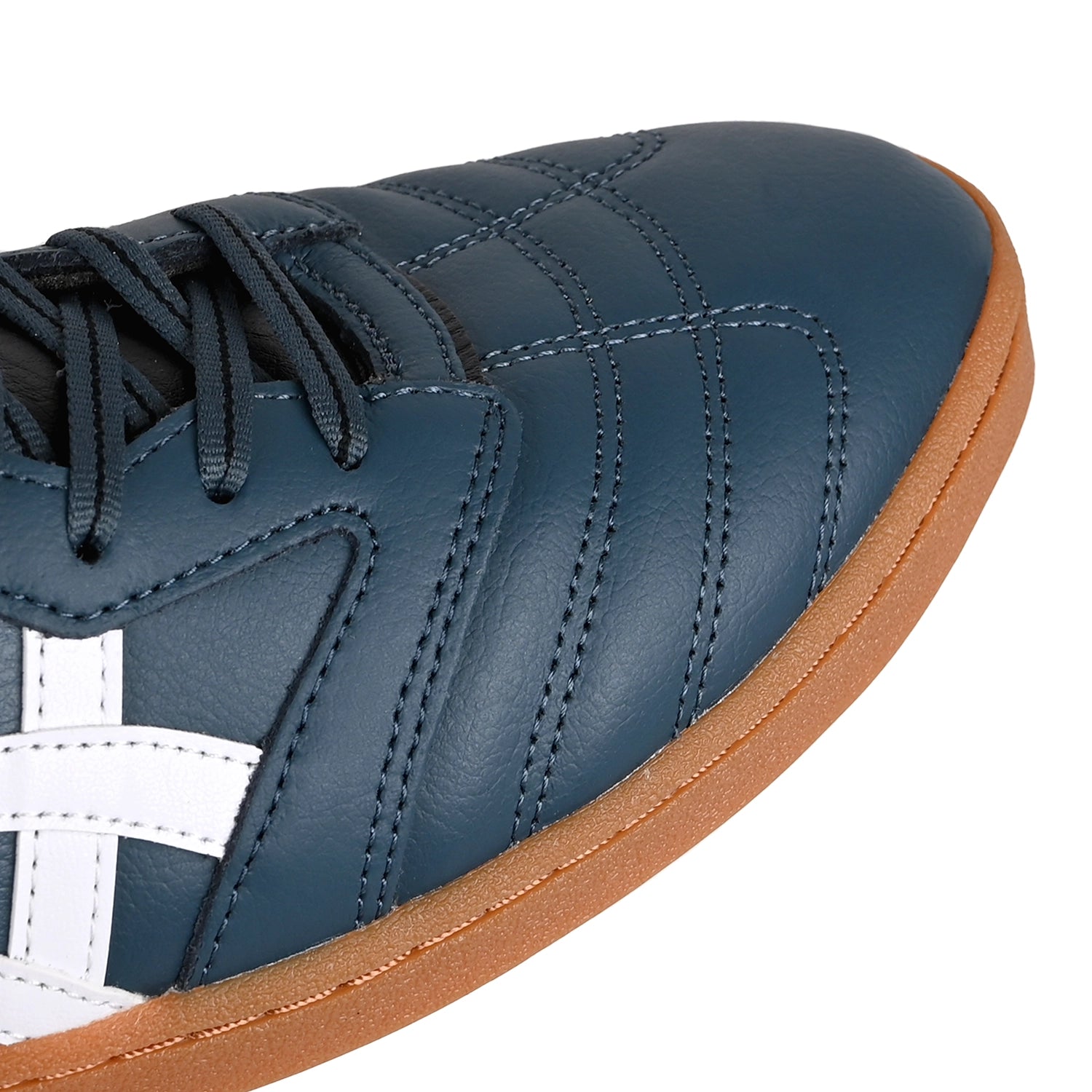 Toe box of Asics Skateboarding Leggerezza FB Pro toe box in Raw Indigo and gum sole on white background