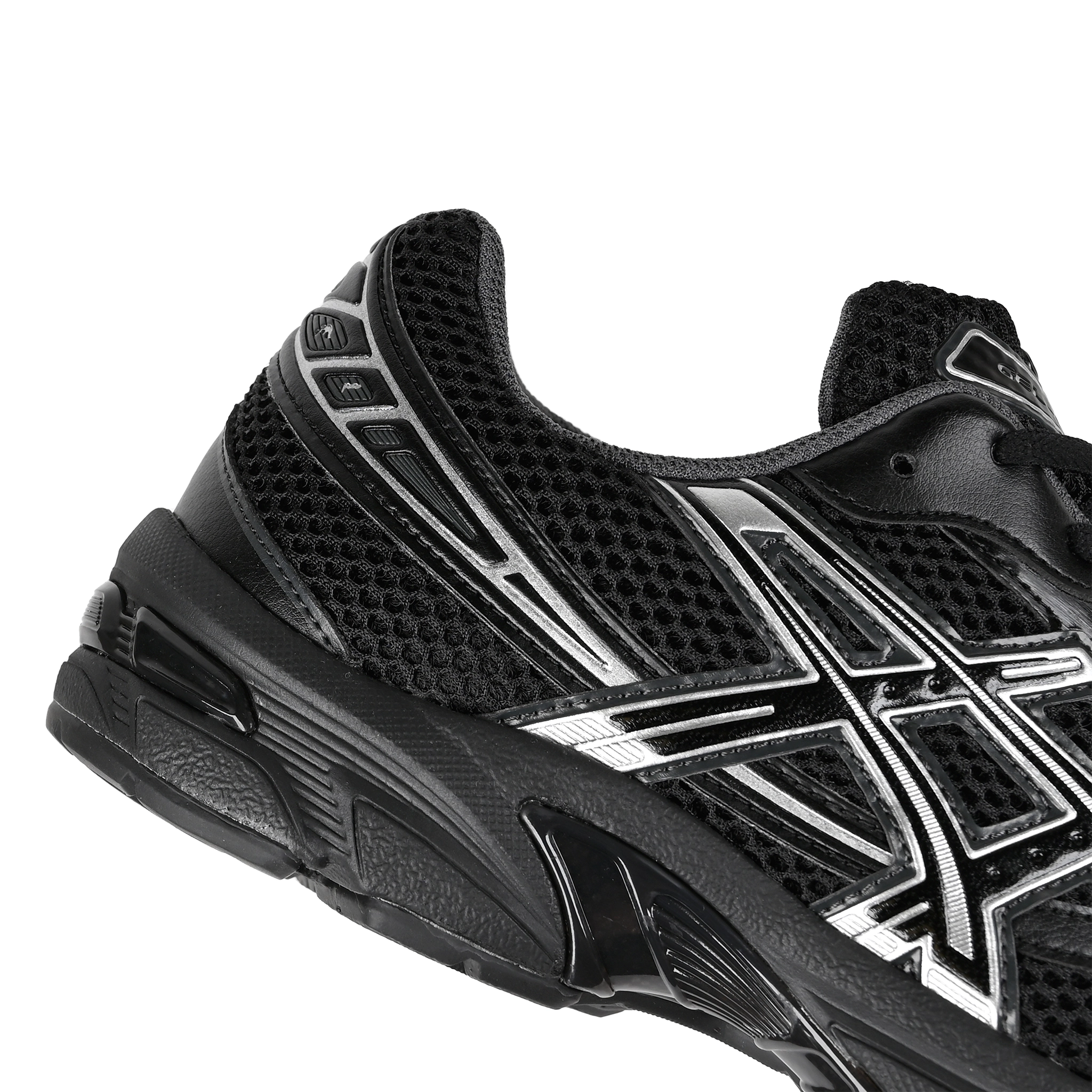Close up of Black ASICS Sportstyle GEL-1130 with pure silver sneaker 'Onitsuka' branding on a white background