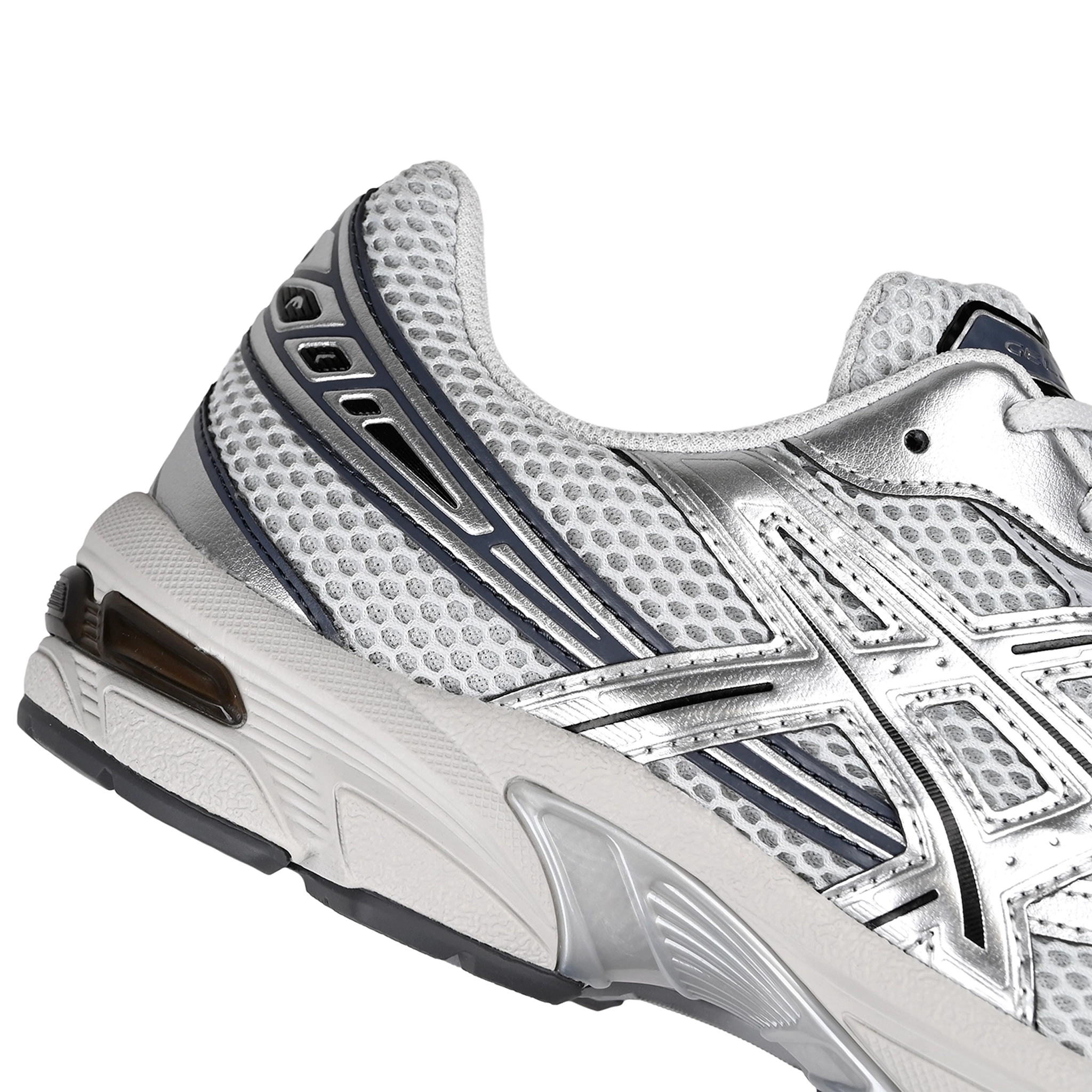 Close up of Glacier grey and pure silver ASICS sportstyle GEL-1130 sneaker with 'Onitsuka' branding on a white background