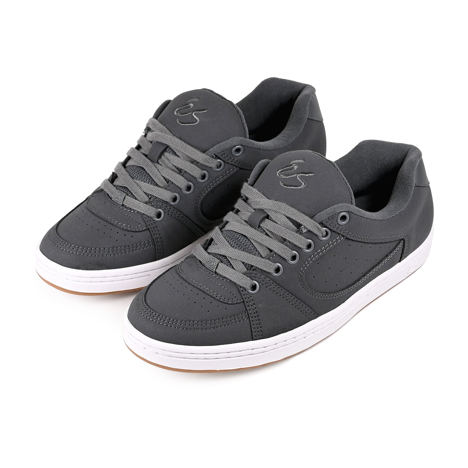 Pair of éS Skateboarding gray Accel mens sneakers with white soles on a white background