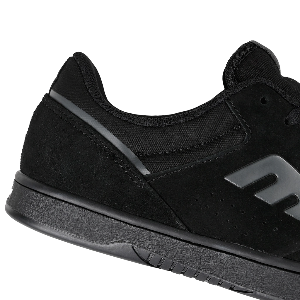Black Etnies Skateboarding shoe with a brand logo on a white background