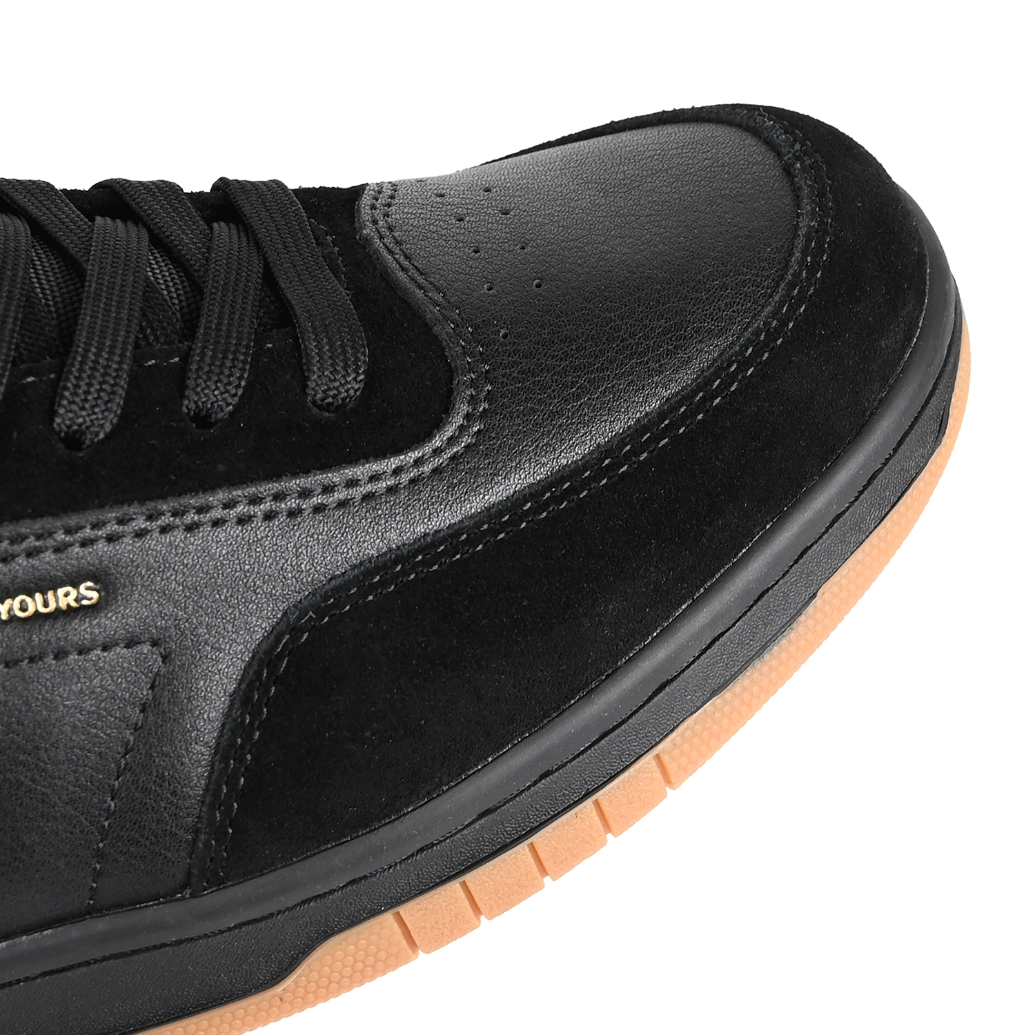 Close up of Black Hours is Yours Bryan Herman pro model skateboard sneaker on a white background