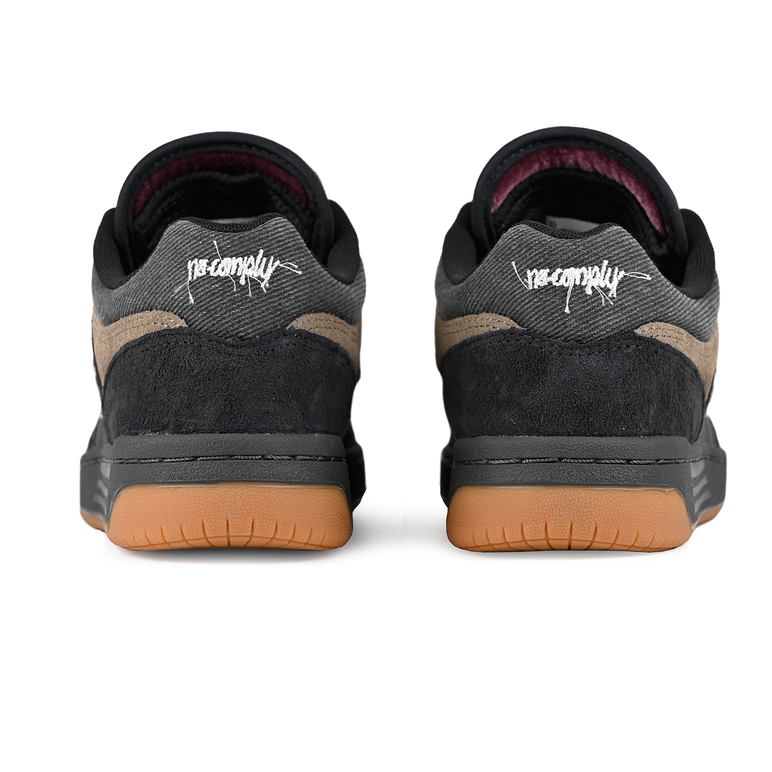 Back of a pair of Black and arid stone New Balance Numeric x No-Comply NM480 skateboard sneakers on a white background