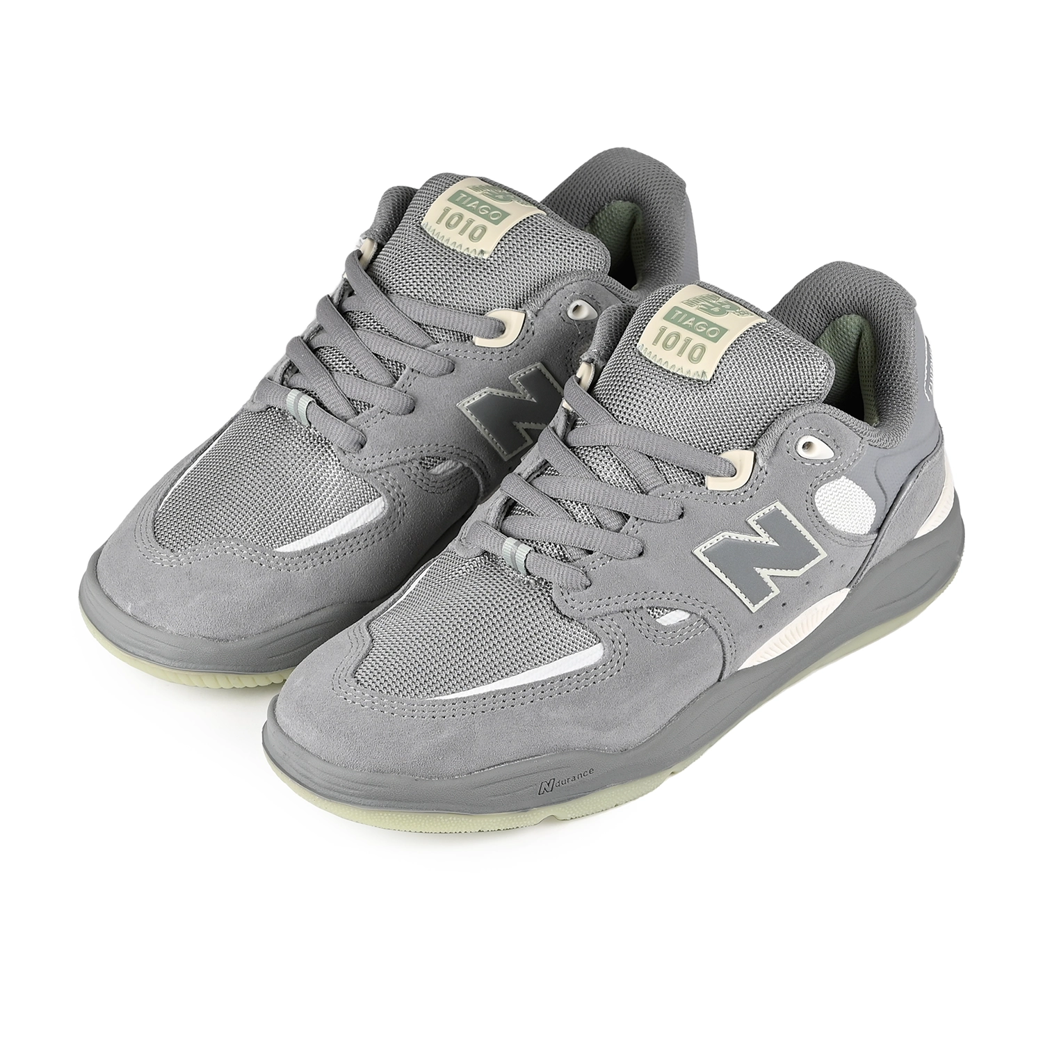 A pair of Slate grey and sea salt New Balance Numeric NM1010 Tiago Lemos pro model men's skateboard sneakers on a white background