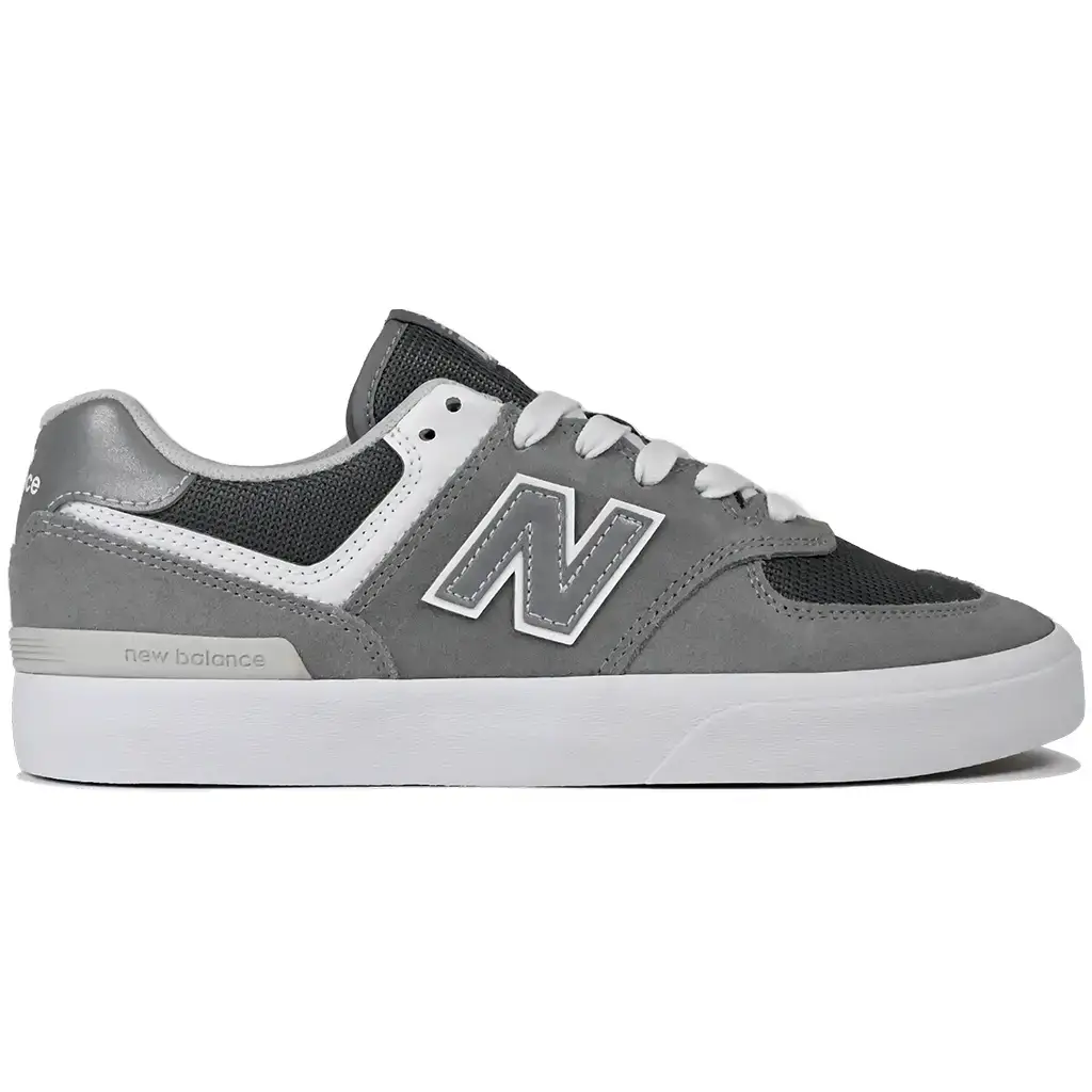 New Balance Numeric NM574 Vulc Skateboarding Shoe in grey and white, featuring durable design and cushioned support.