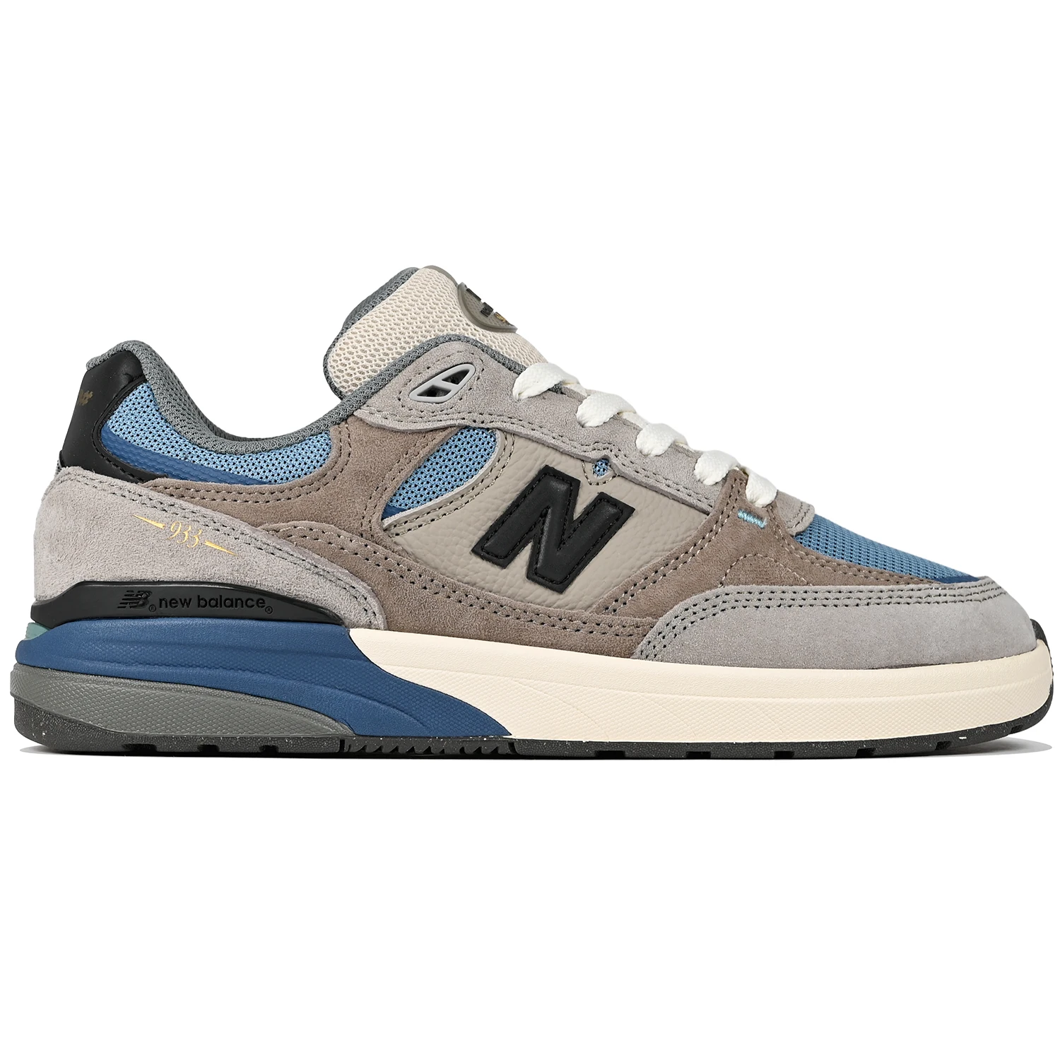 New Balance Andrew Reynolds NM933 sneaker in gray and blue with New Balance logo on a white background