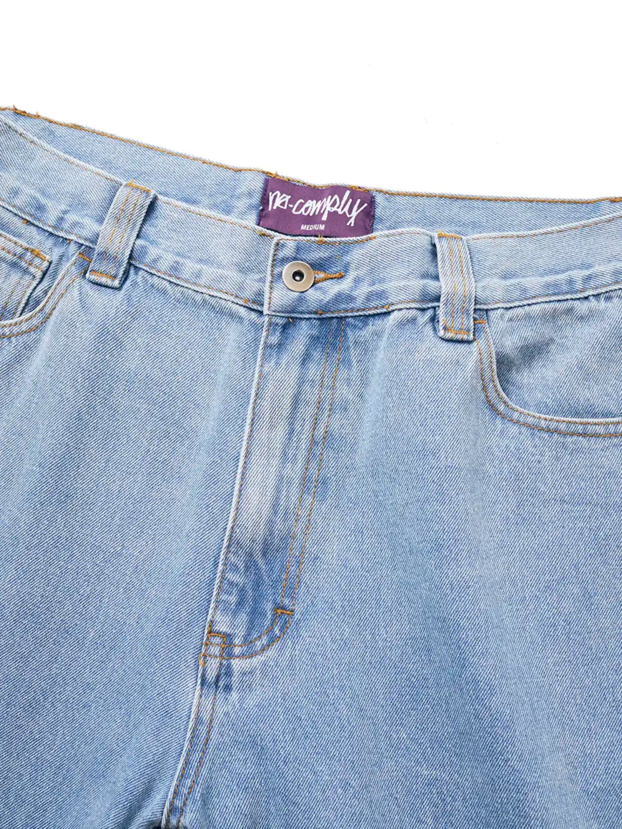 Close up front view of Light Wash No-Comply Loose Fit denim jeans on a white background