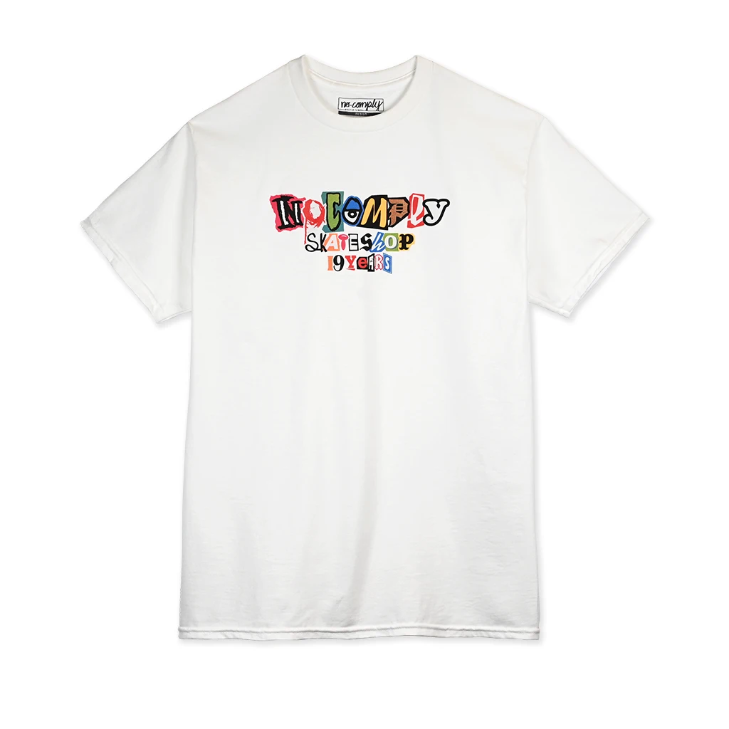 White No-Comply t-shirt with colorful text design on a white background