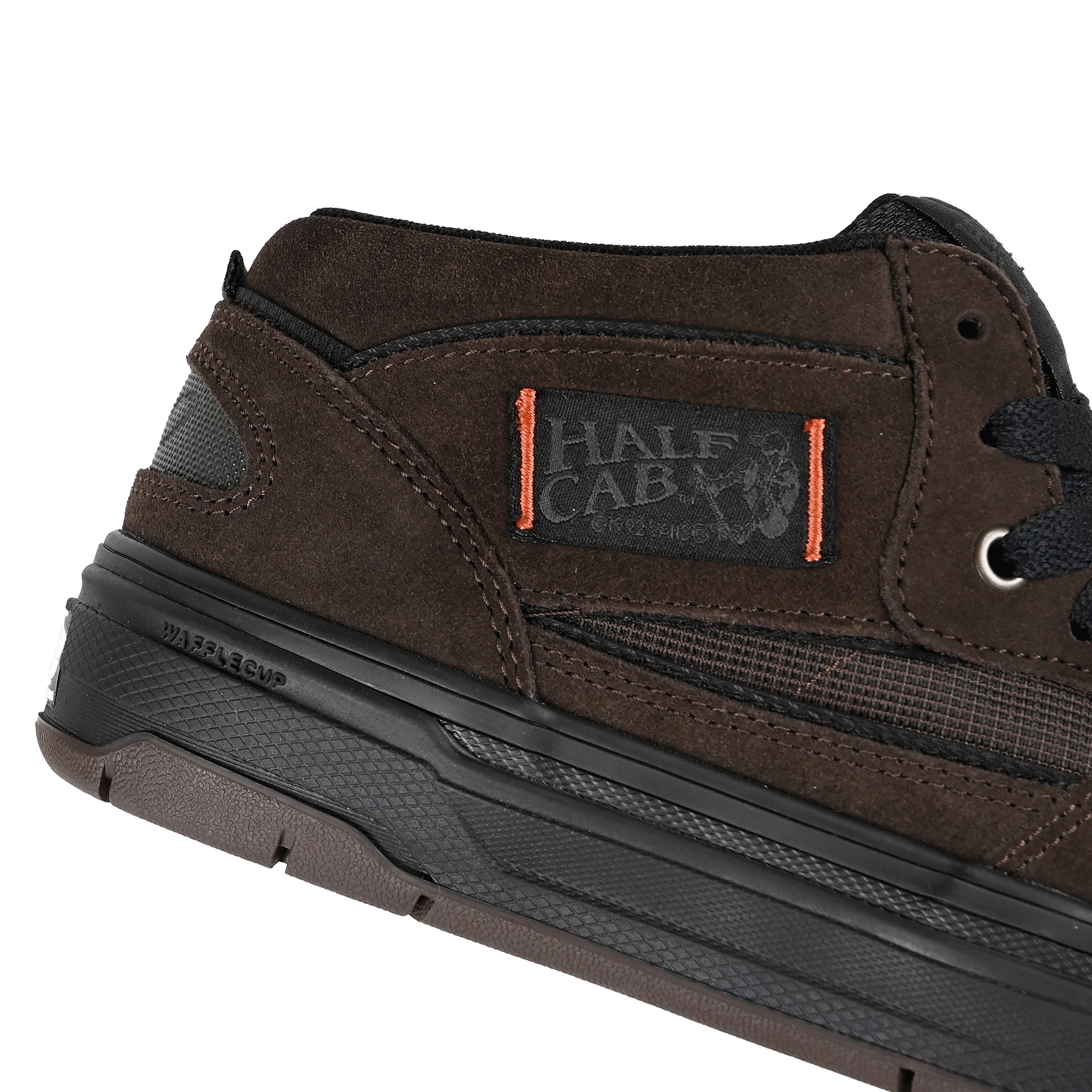 Close up of brown and black Vans Skateboarding Half Cab Wafflecup skateboard sneaker by Dick Rizzo on a white background