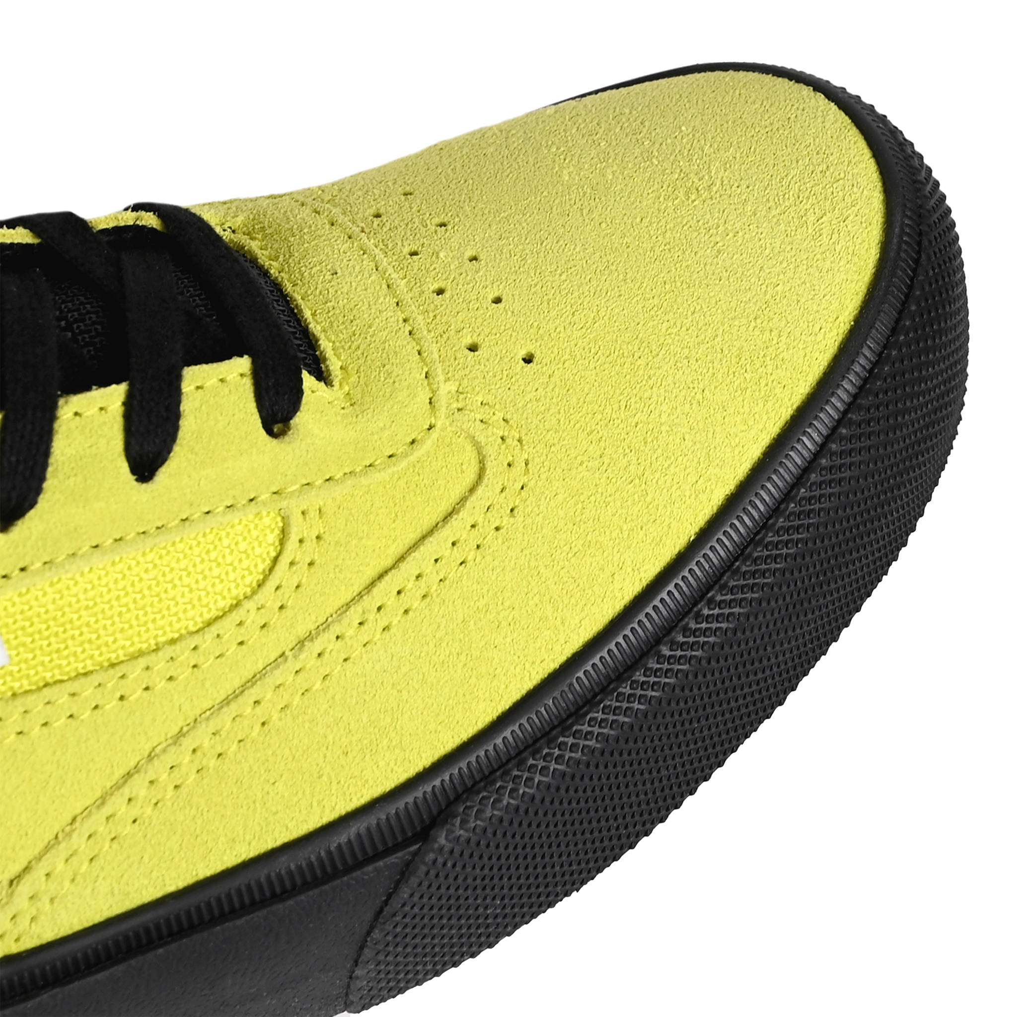 Toe box of Fluro Lime Vans Skateboarding Skate Curren Caples pro model skateboard sneaker with a black midsole on a white background