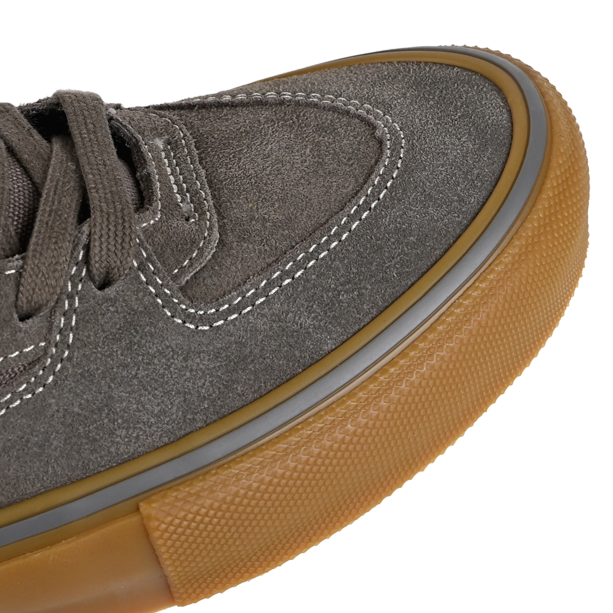 Toe box of Walnut Vans Skateboarding Skate Half Cab skateboard sneaker with a gum sole on a white background