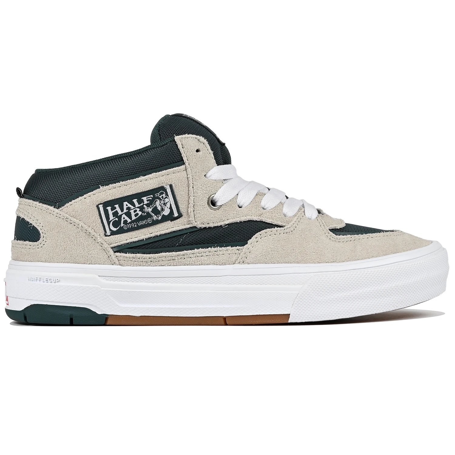 Vans Half Cab Wafflecup sneaker in tan and green with a visible brand logo on a white background