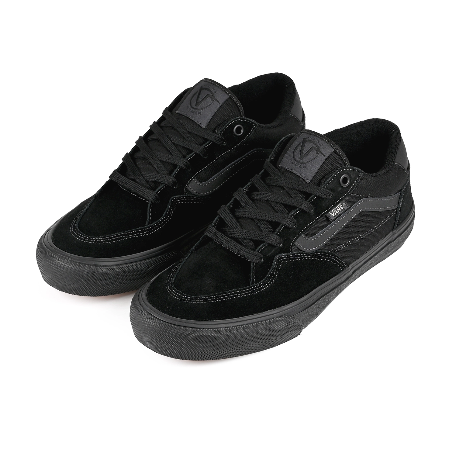 A pair of Vans Rowan sneakers in black with black sole on a white background