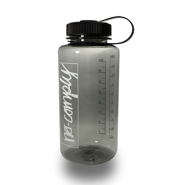 1000 milliliter (34 ounce) BPA free water bottle with No-Comply Script Box font printed on front with screw top, available exclusively at No-Comply Skate Shop in Austin, TX
