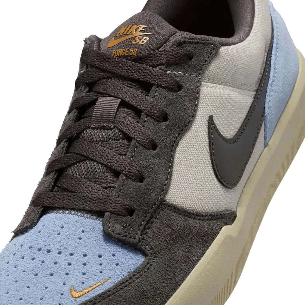 Nike SB Force 58 sneaker in LT Orewood Brown and Psychic Blue featuring durable cupsole and retro design.
