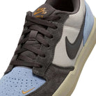 Nike SB Force 58 sneaker in LT Orewood Brown and Psychic Blue featuring durable cupsole and retro design.