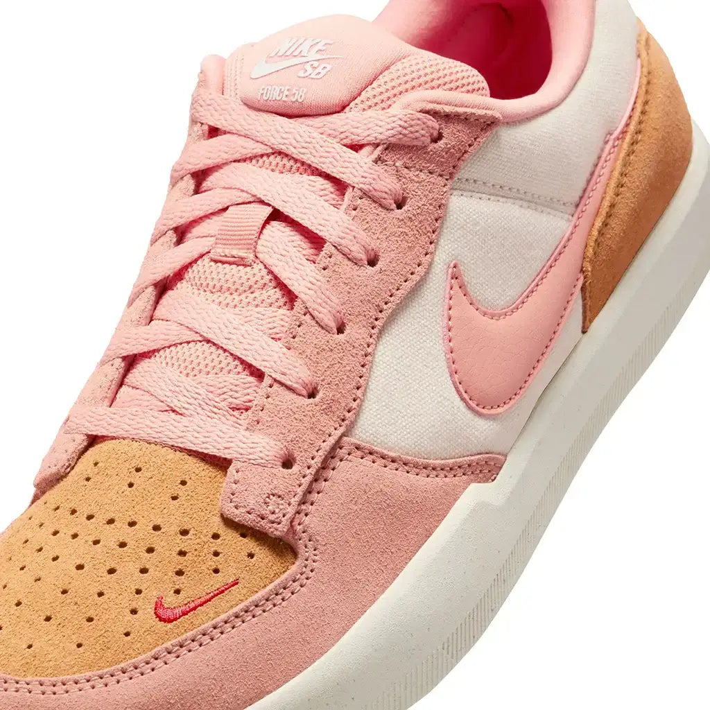 Nike SB Force 58 sneaker in pale ivory and apricot agate, featuring durable cupsole and retro branding.