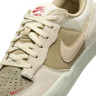 Close up of Coconut Milk Nike SB Force 58 men's skateboard sneaker on a white background