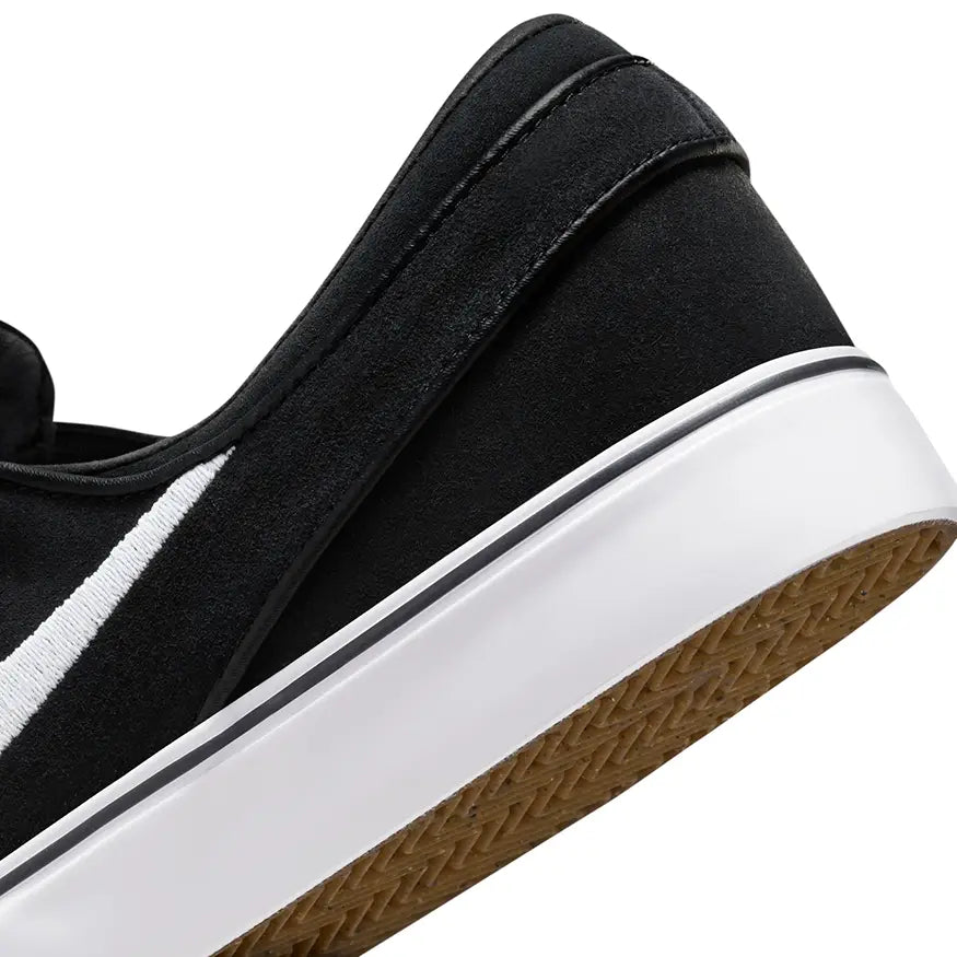 Janoski slip on black white sales