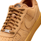 Front of Flax brown Nike SB Air Force 1 skateboard sneaker on a white background