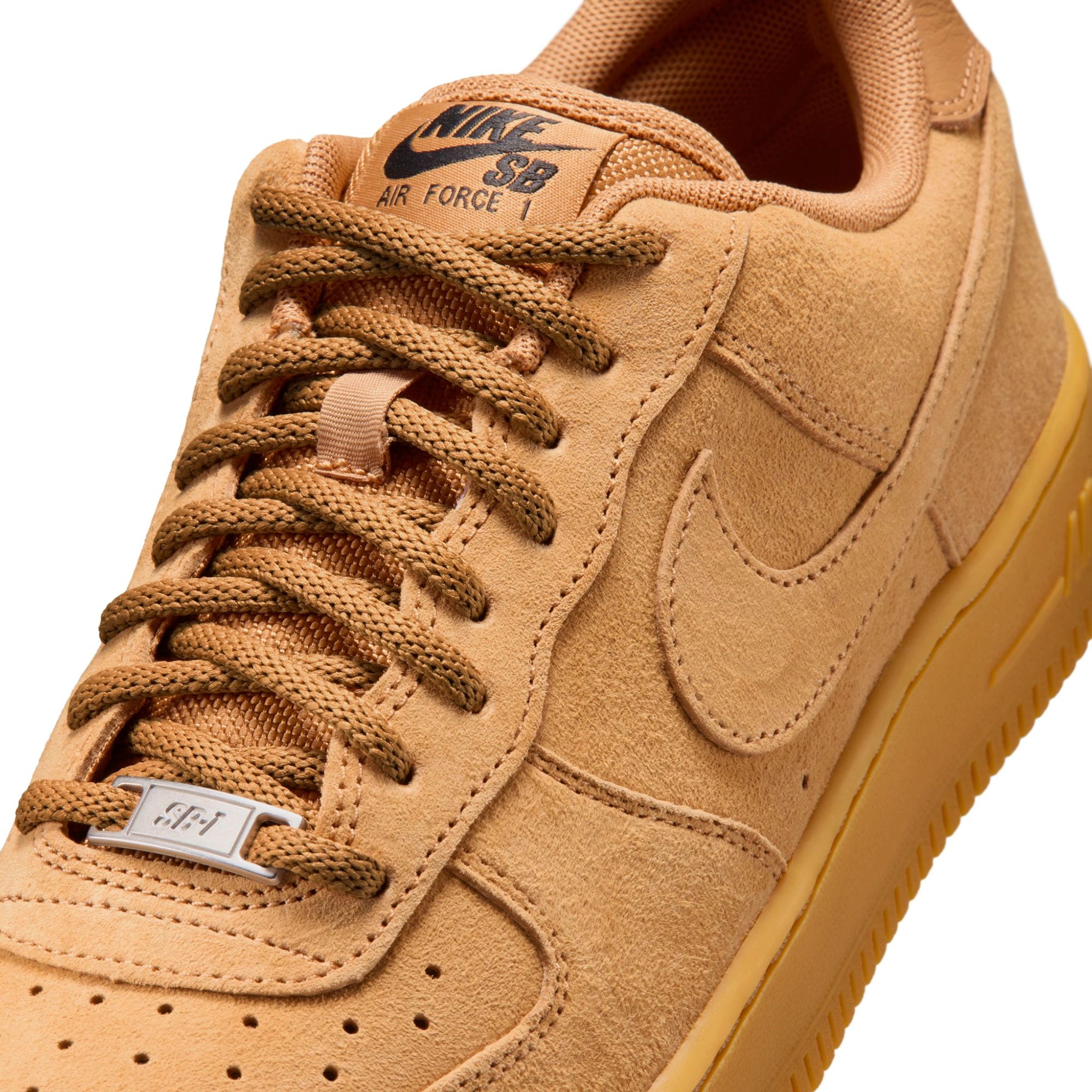 Front of Flax brown Nike SB Air Force 1 skateboard sneaker on a white background
