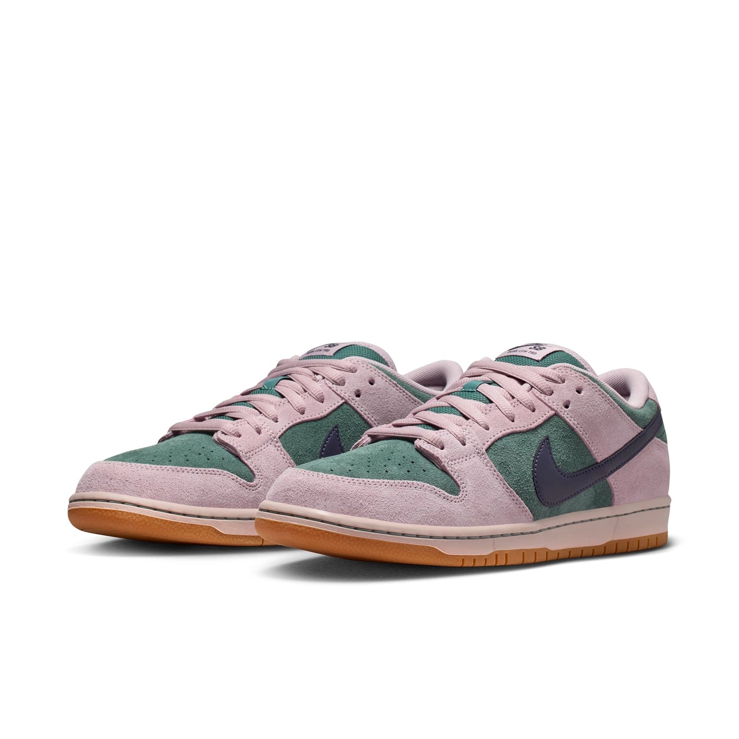A pair of Green and Pink Nike SB Dunk Low skateboard sneakers on white background