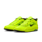 A pair of Volt Yellow Nike SB Ishod Wair pro model skateboard sneakers with swoosh branding on a white background
