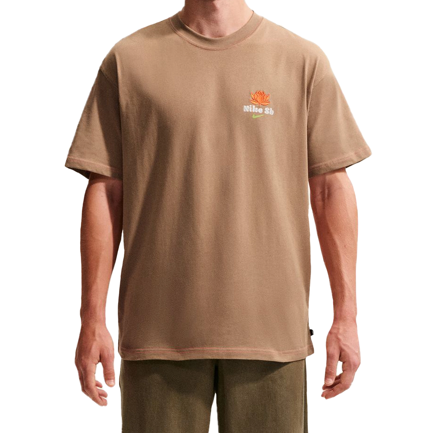 A model wearing Driftwood Nike SB Thai New Year men's skate t-shirt with printed graphic on left chest