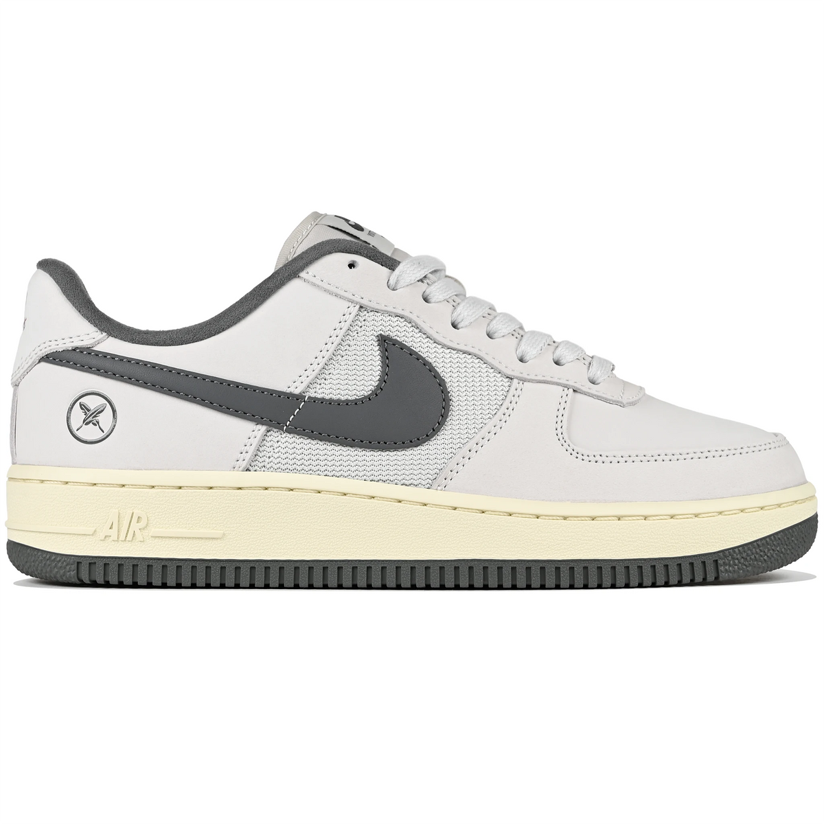 White leather and mesh Nike SB x Yuto Horigome Air Force 1 skateboard sneaker with iron grey swoosh and family crest on a white background