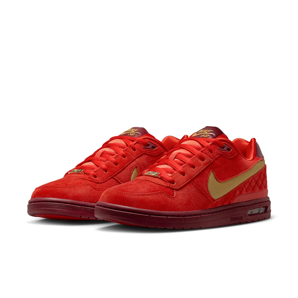 Nike SB P-Rod 1 red sneakers with a gold Nike logo on a white background