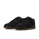 A pair of Black and gum Nike SB Paul Rodriguez pro model men's skateboarding sneakers on a white background
