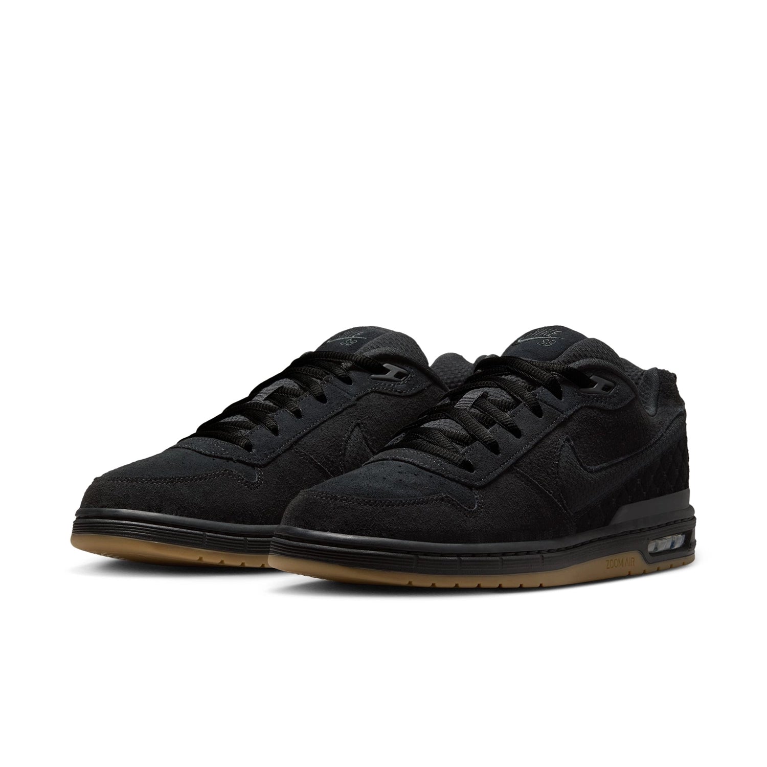 A pair of Black and gum Nike SB Paul Rodriguez pro model men's skateboarding sneakers on a white background