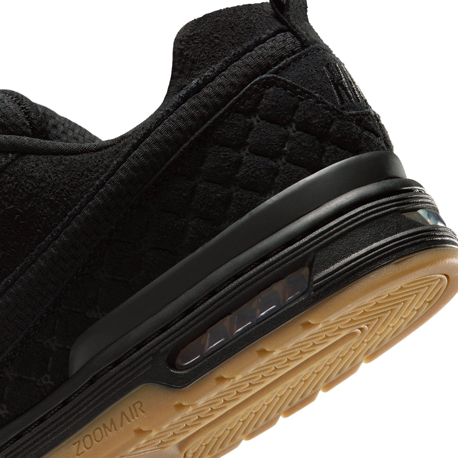 Close up of Black and gum Nike SB Paul Rodriguez pro model men's skateboarding sneaker on a white background