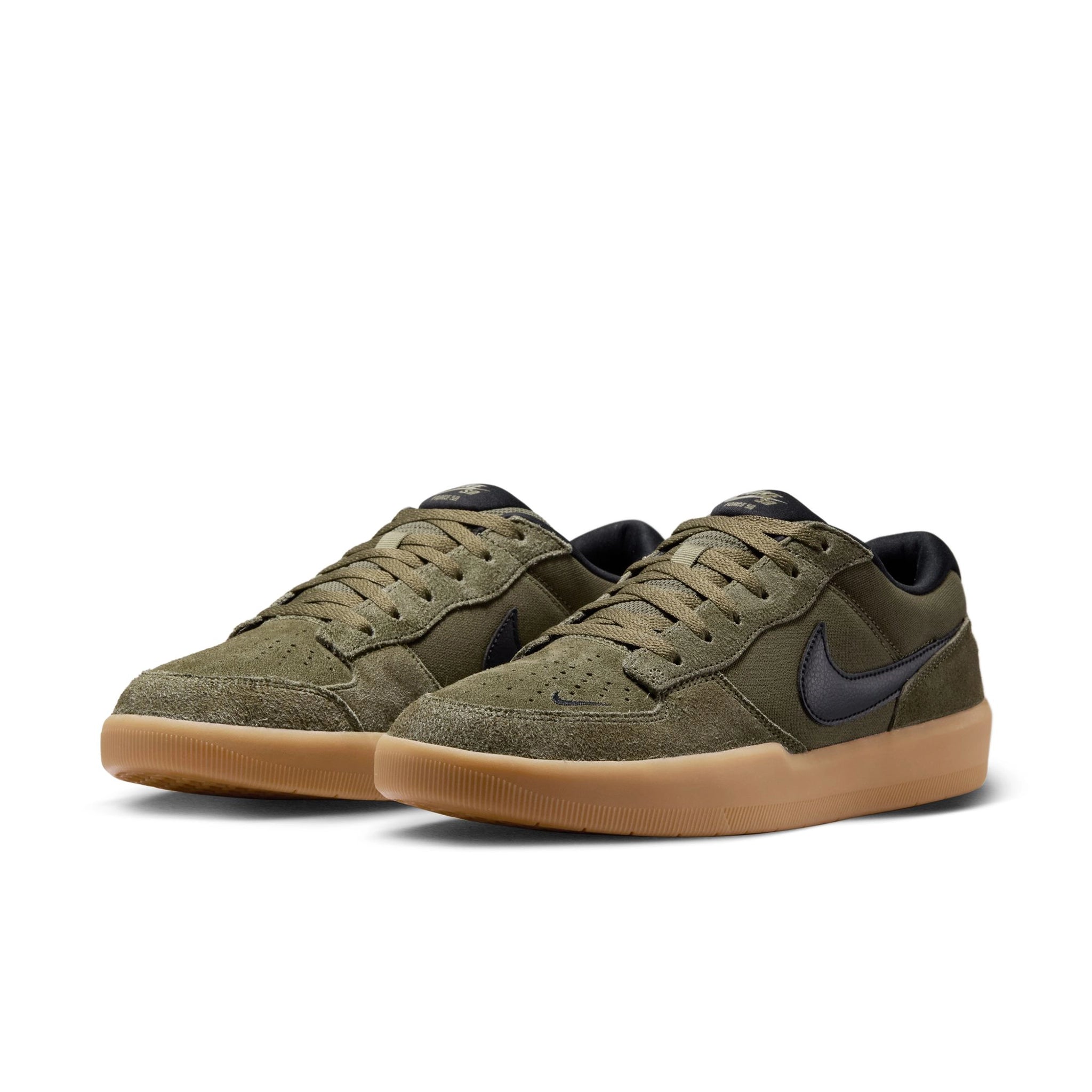 A pair of Medium olive Nike SB Force 58 skateboard sneakers with black swoosh branding on a white background