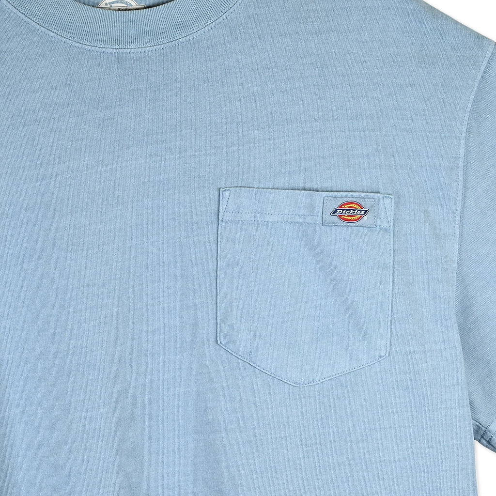 Light blue Dickies t-shirt with a pocket and Dickies logo on a white background
