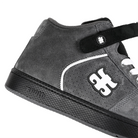 Detail of Grey suede I-Path Footwear Grasshopper Mid skateboard sneaker with a black sole on a white background