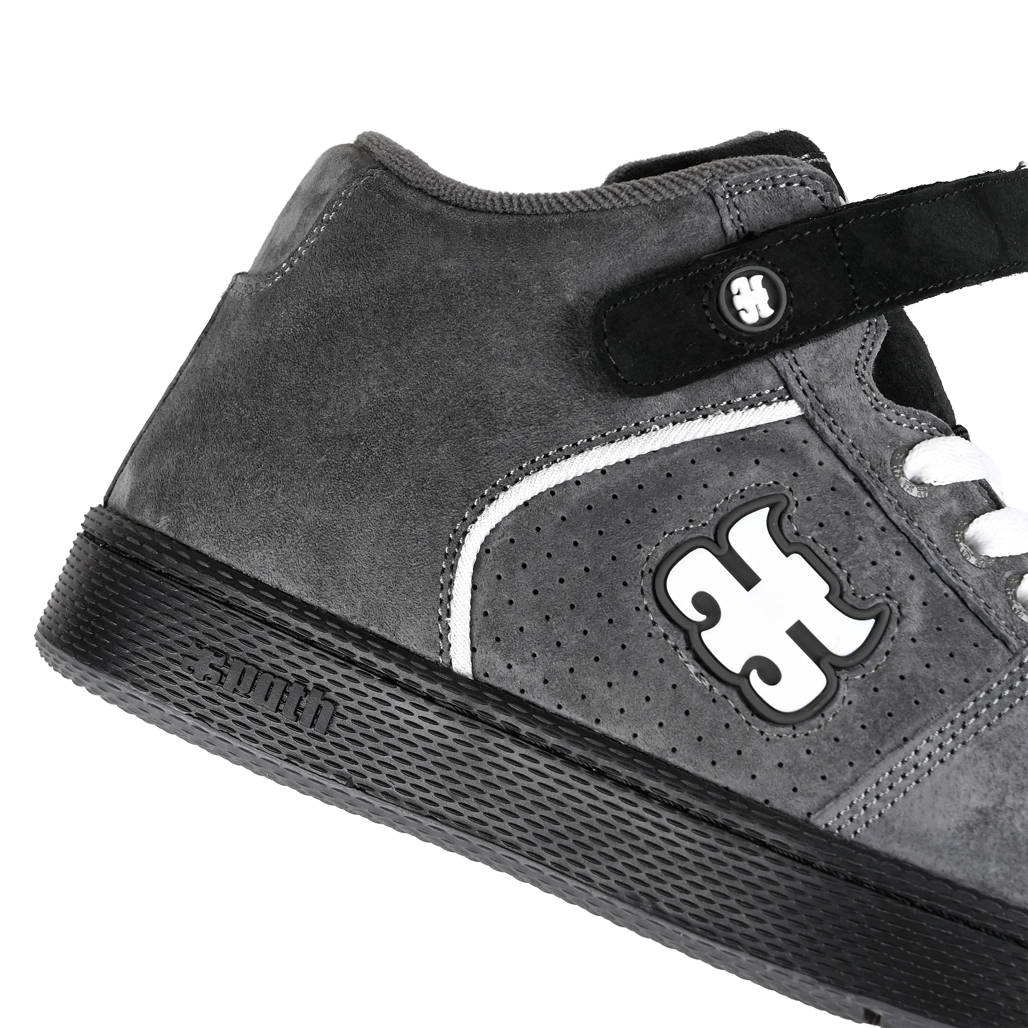 Detail of Grey suede I-Path Footwear Grasshopper Mid skateboard sneaker with a black sole on a white background