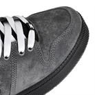 Toe box of Grey suede I-Path Footwear Grasshopper Mid skateboard sneaker with a black sole on a white background