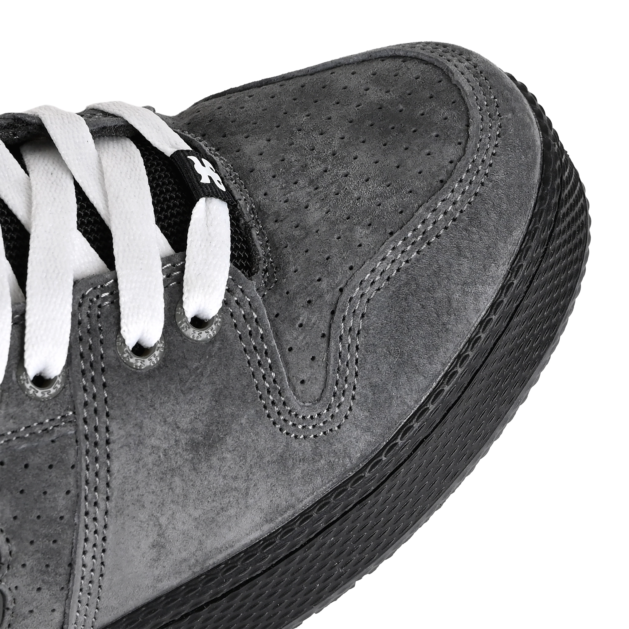 Toe box of Grey suede I-Path Footwear Grasshopper Mid skateboard sneaker with a black sole on a white background