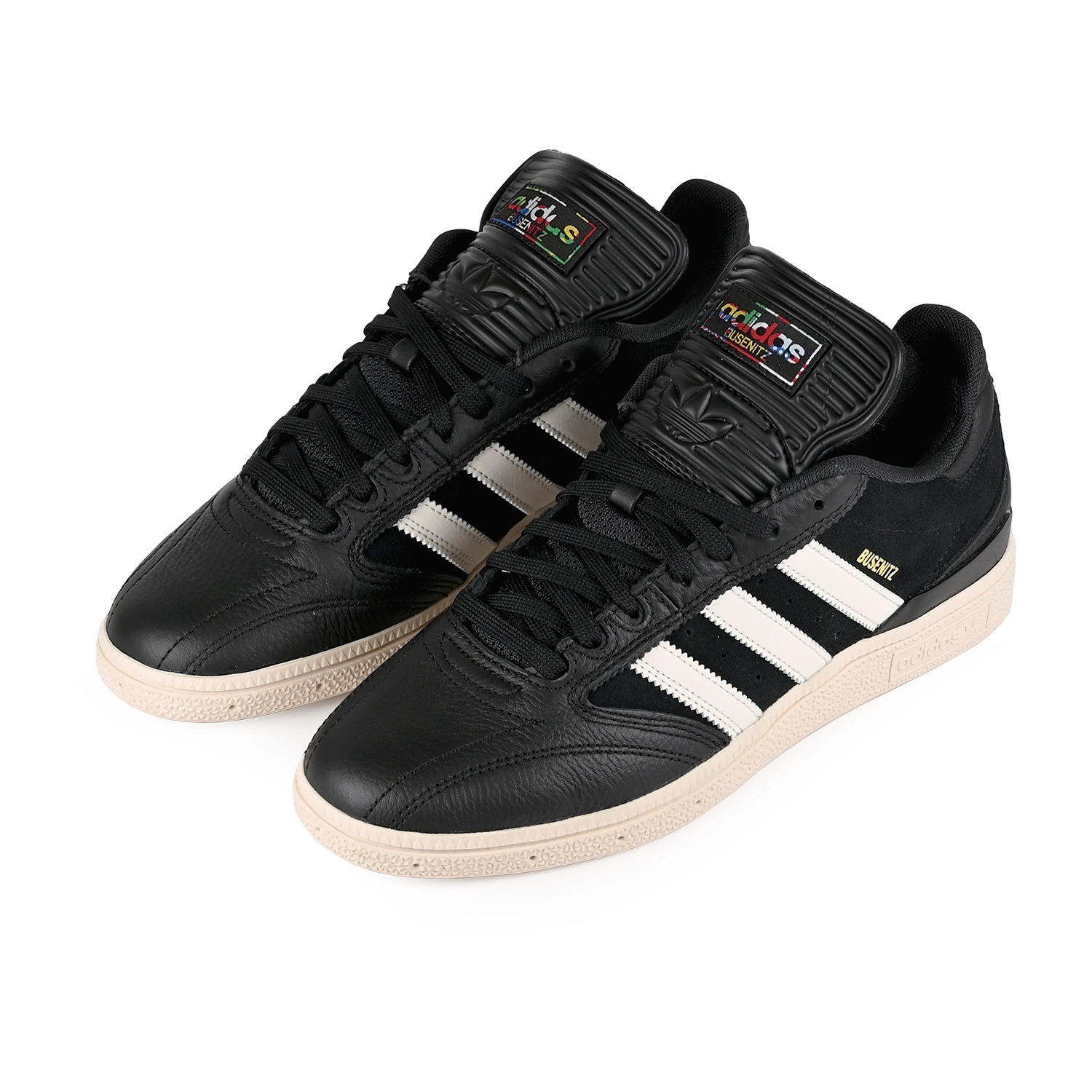 A pair of Core black cloud white Adidas Skateboarding Dennis Busenitz pro model men's skateboard sneakers on a white background