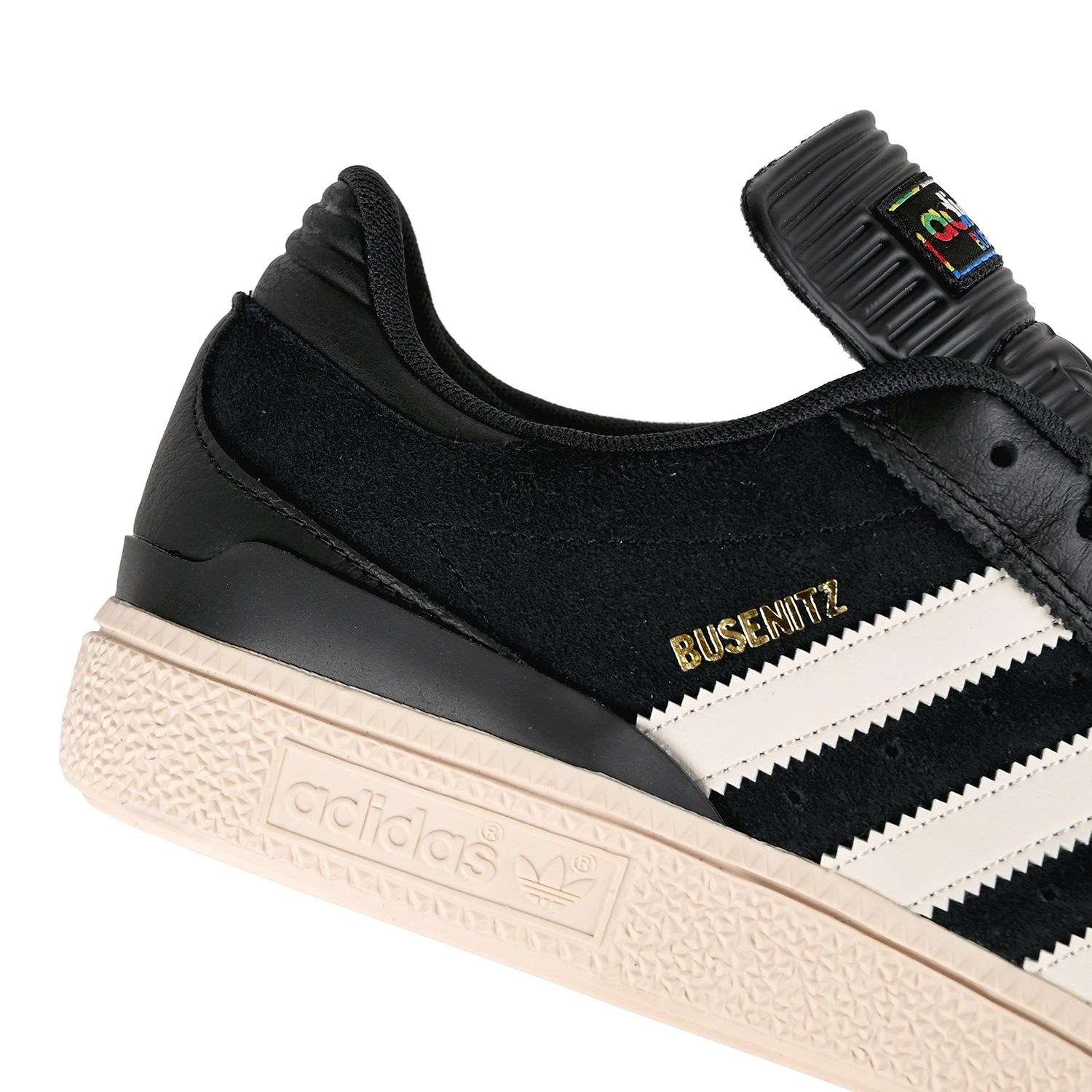 Close up of Core black cloud white Adidas Skateboarding Dennis Busenitz pro model men's skateboard sneaker on a white background